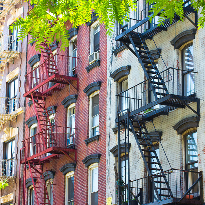 colorful building having attached stairs